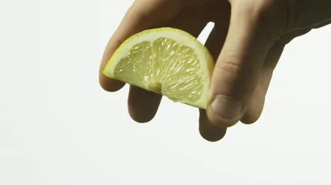 Squeezing lemon Stock-Footage 67358837