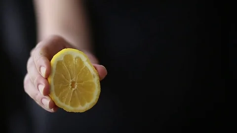 Squeezing a lemon Stock Footage 73023723