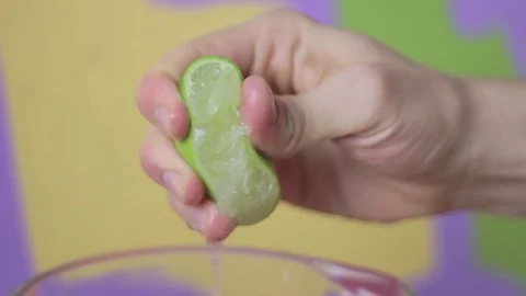 Squeezing a lemon Stock Footage 75584735