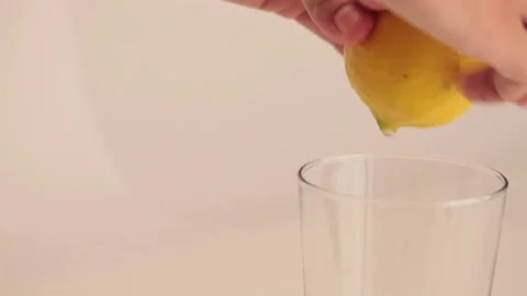 Squeezing a lemon Stock Footage 133813529