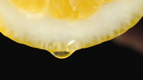 Squeezing lemon juice. Stock Footage 113265323