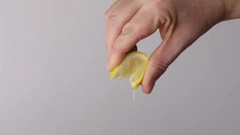 Squeezing Lemon Slice Stock Footage 323246483