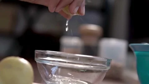 Squeezing Lemon Vegan Lettuce Salad Dressing. Vegan Raw Food On Diet. Stock-Footage 336588610