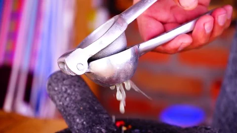 Squeezing lemons for cooking Stock Footage 129401664