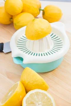 Squeezing lemons Stock Photos