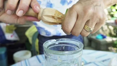 Squeezing Lime for Cocktails Stock Footage 76447282