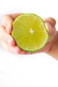 Squeezing a lime Stock Photos