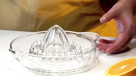 Squeezing an orange Stock Footage 8573802