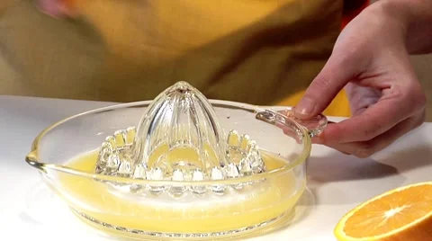 Squeezing an orange Stock Footage 8573803