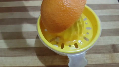 Squeezing orange 스톡 동영상 134271658