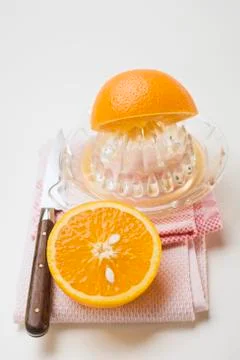 Squeezing an orange Stock Photos