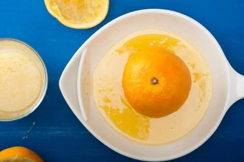 Squeezing orange Stock Photos
