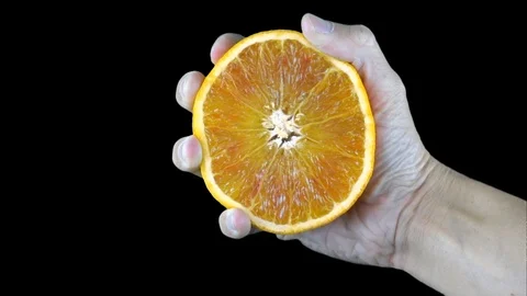 Squeezing an Orange, Slow Motion Stock Footage 108175308