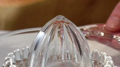 Squeezing a pink grapefruit (close-up) Stock Footage 8573765