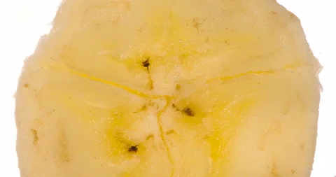 Squeezing Two Banana Pieces 4K Stock Footage 96739049