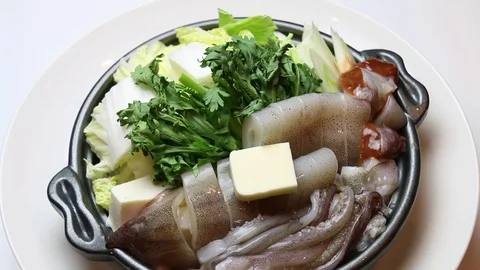 Squid and vegetable hot pot Stock Footage 82558403