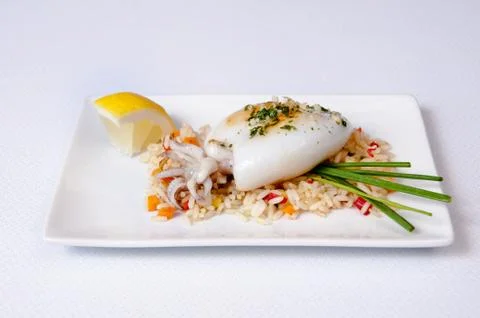 Squid dish on a white background Stock Photos