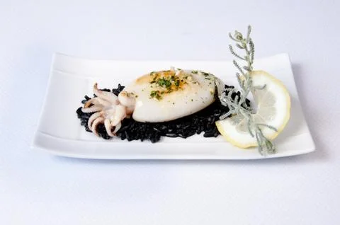 Squid dish on a white background Stock Photos
