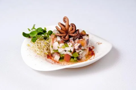 Squid dish on a white background Stock Photos