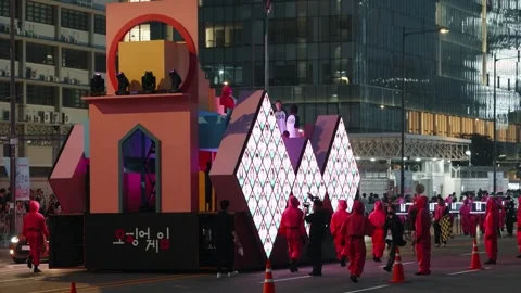 Squid Game Themed Float at Night Parade Stock Footage 312741365