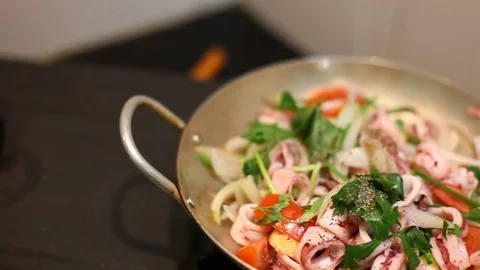 Squid, green vegetable, onions stir-fried in a pan for healthy food 스톡 동영상 75515340