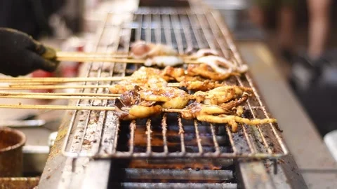 Squid on grill close up Stock Footage 266374402