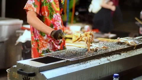 Squid on grill Stock Footage 266374765