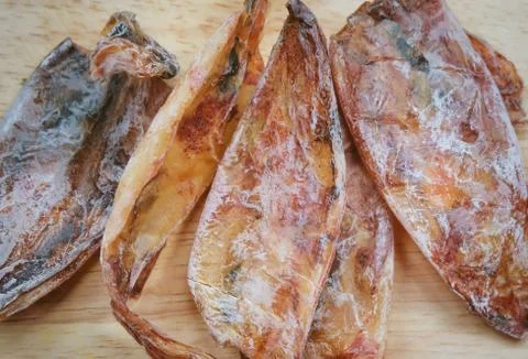 Squid or Octopus Salted and Dried by The Sun Stock Photos