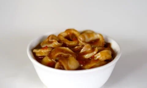 Squid in Padang Sauce Stock Photos