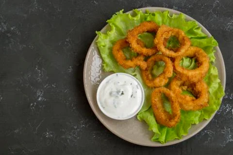 Squid rings deep fried with crispy crust. Stock Photos