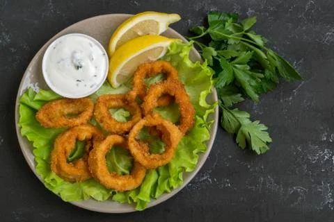 Squid rings deep fried with crispy crust. Stock Photos