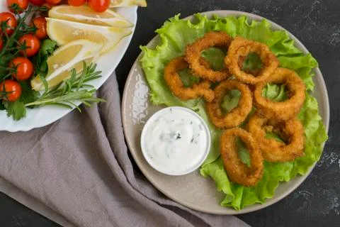 Squid rings deep fried with crispy crust. Stock Photos