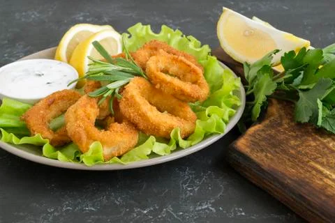 Squid rings deep fried with crispy crust. Stock Photos