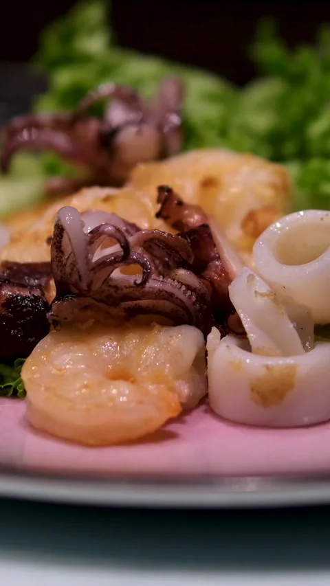 Squid rings fried shrimp Squid Salad, Spicy squid salad, should be served Stock Footage 302803916