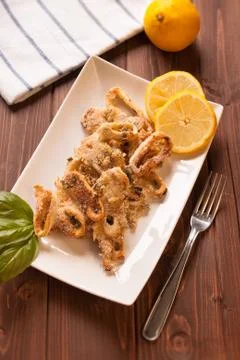 Squid rings gratin Stock Photos