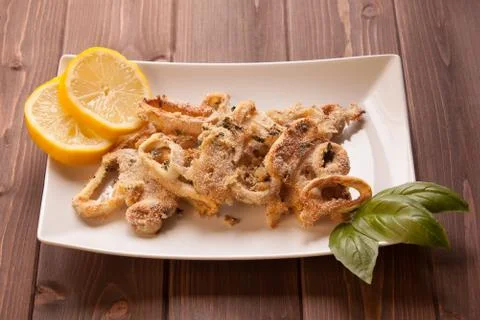 Squid rings gratin Stock Photos