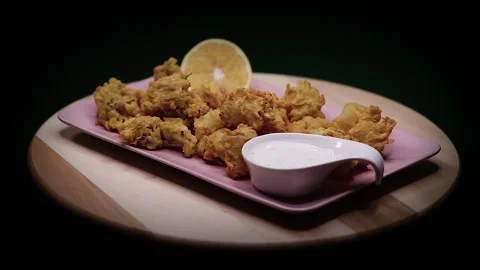 Squid with Sauce and Lemon Stock Footage 152715633