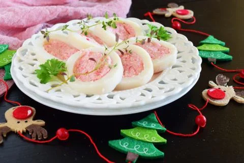 Squid stuffed with crab meat mousse. Stock Photos
