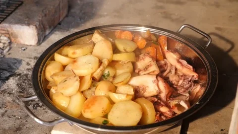 Squid under the lid with potatoes Stock Footage 87647020