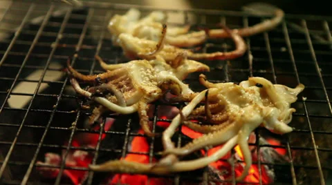 Squid's whisker roasting Stock Footage 35922577