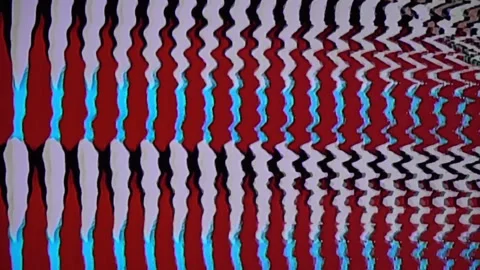 Squiggly vertical line pattern produced by video synthesizer. Stock Footage 314926633