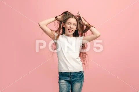 The squint eyed teen girl with weird expression Stock Photos