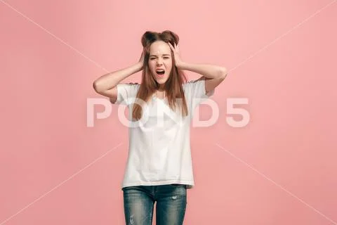 The squint eyed teen girl with weird expression Stock Photos
