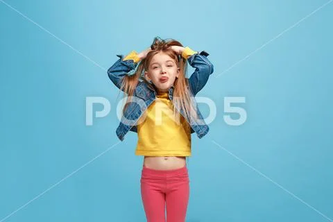 The squint eyed teen girl with weird expression Stock Photos