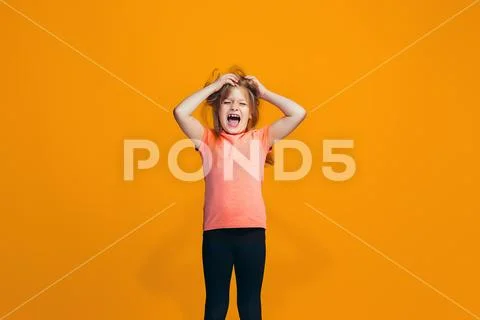 The squint eyed teen girl with weird expression Stock Photos