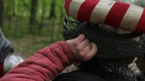 Squire helping to Knight to put his armor before the next battle Stock-Footage 40521034