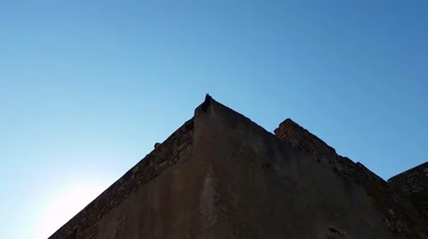 А squirrel  on the wall of the castle Vídeos de archivo 57763138