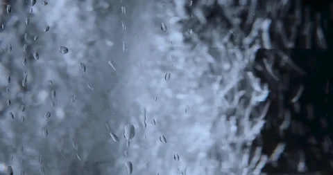 Squirt of Water Under Surface Stock Footage 121442652