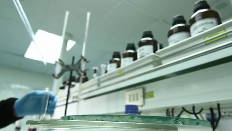Squirting liquid into test tube Stock Footage 77051875