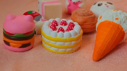 Squishy dessert toy plush background Stock Footage 115940422